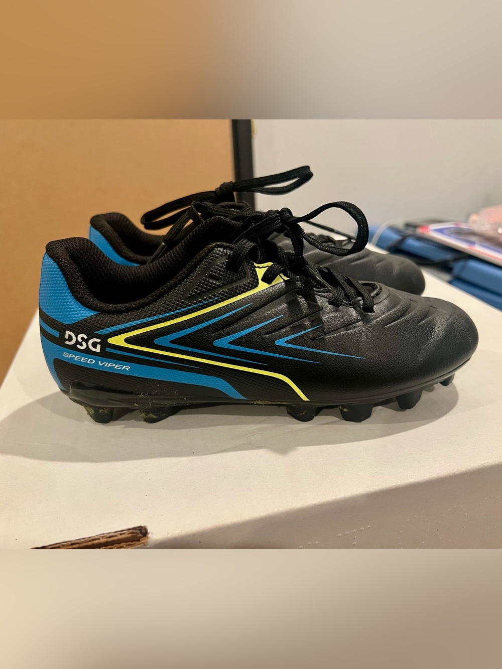 DSG Kids Black Soccer Cleats with Blue & Yellow Accents LIKE NEW condition